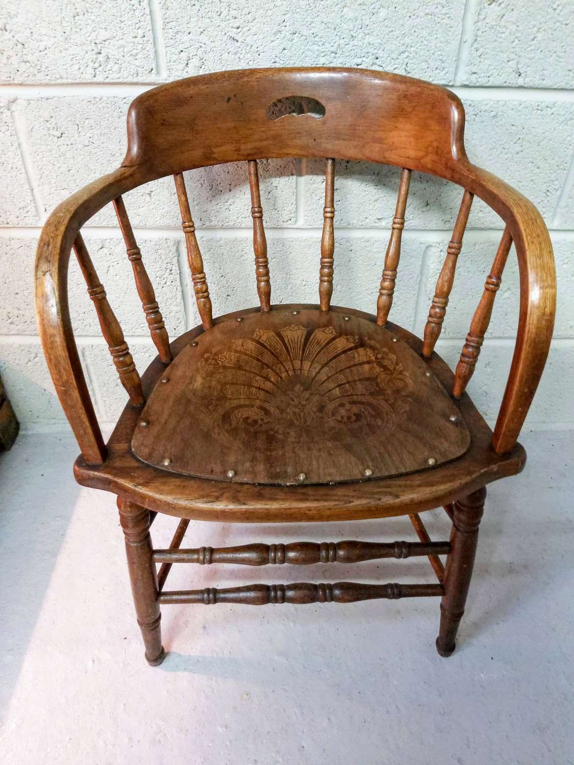 C1900 oak spindle back tub chairs
