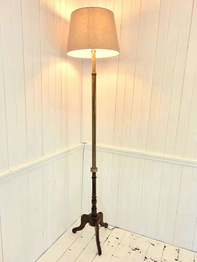 Early 20th century mahogany and brass standard lamp