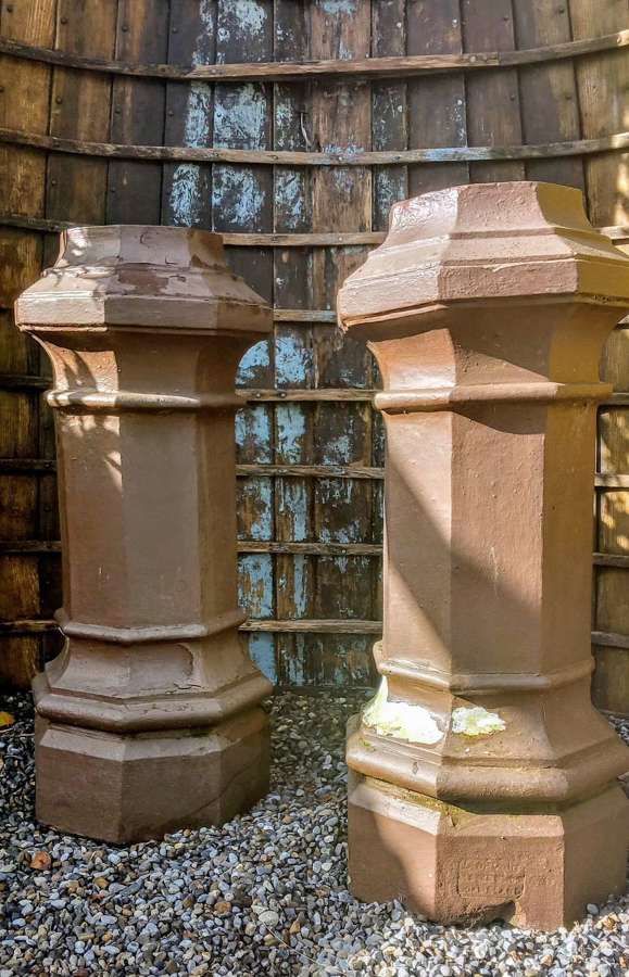 A pair of painted octagonal Victorian Chimney pots