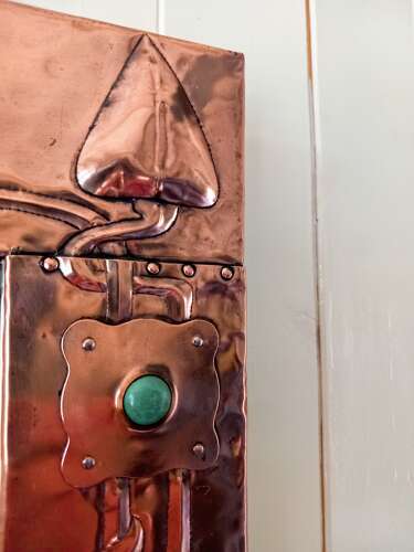 An Arts&Crafts/Art Nouveau period copper framed mirror in the manner of Liberty&Co