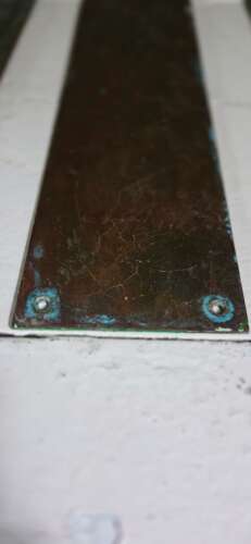 Early 20th century pair of patinated Brass door Fingerplates