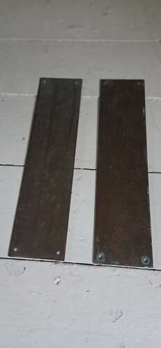 Early 20th century pair of patinated Brass door Fingerplates
