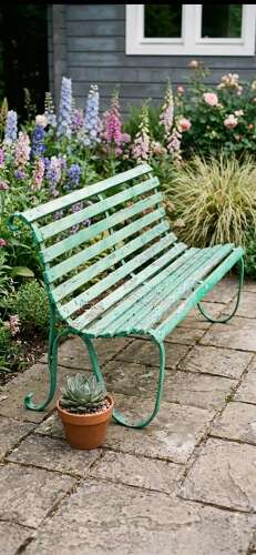 C1900 wrought iron and wooden slatted Garden Bench