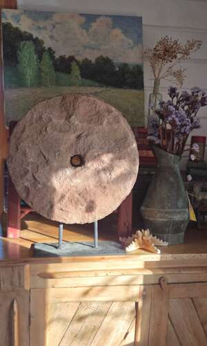 19th Century Millstone on stand