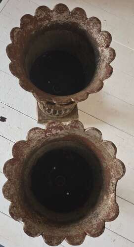 A pair of Andrew Handyside cast iron Lotus pattern garden Urns c1860