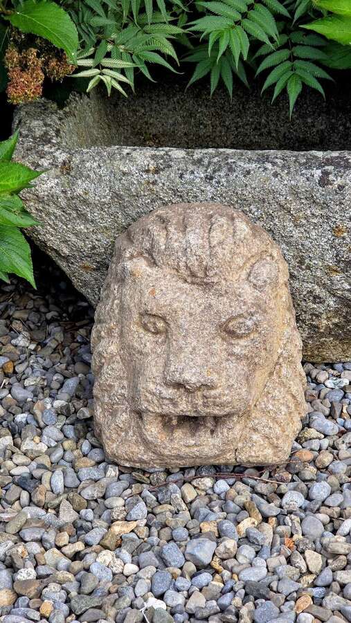 An early antique Irish carved Granite Lion Mask Spout