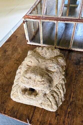 An early antique Irish carved Granite Lion Mask Spout