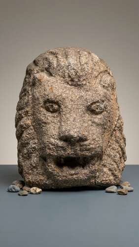 An early antique Irish carved Granite Lion Mask Spout
